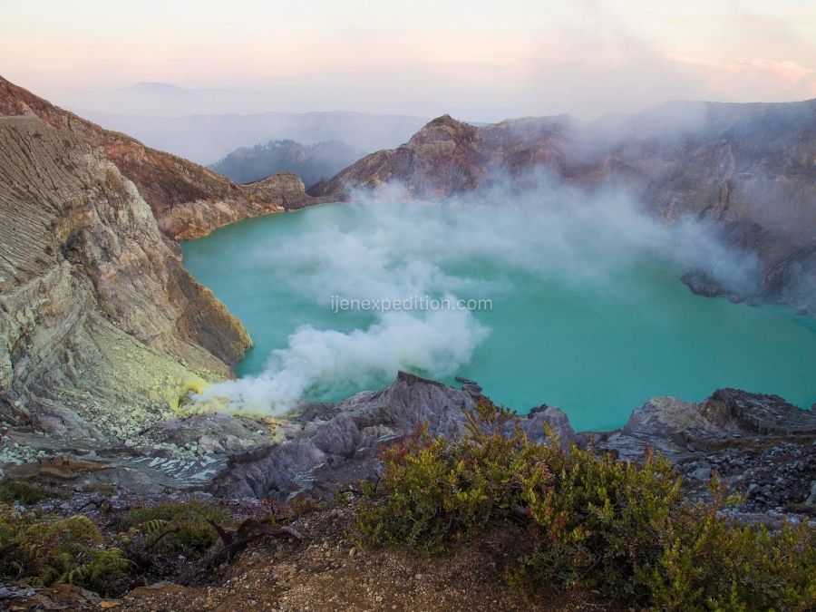 turquoise acidic crater lake at kawah ijen volcano