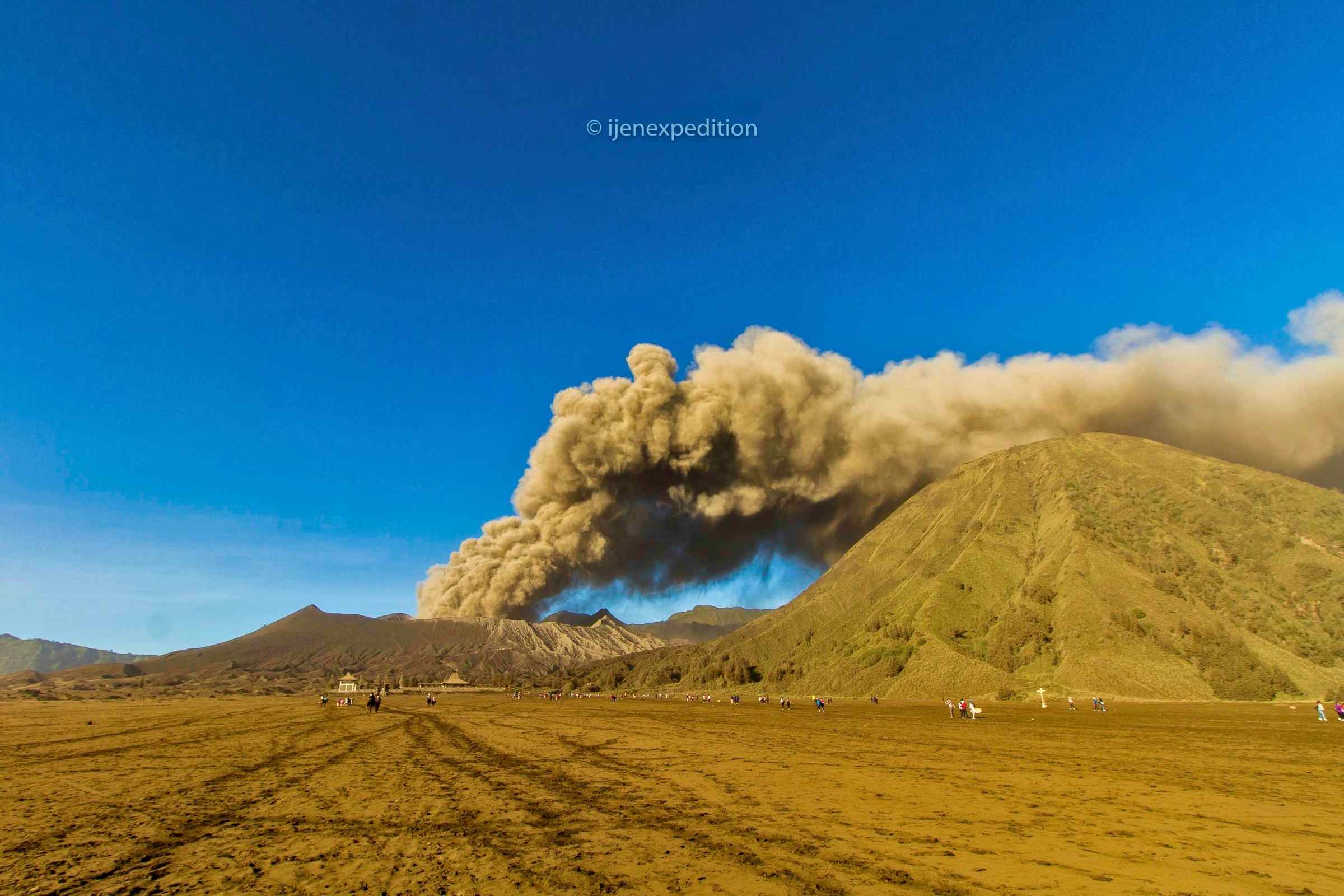 Visitors climbing Mount Bromo crater stairs in East Java
