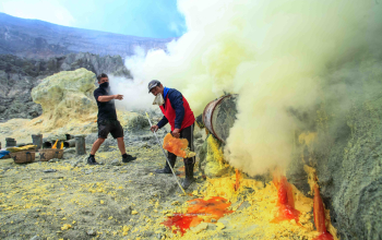 The Sulfur Miners of ijen crater east Java indonesia