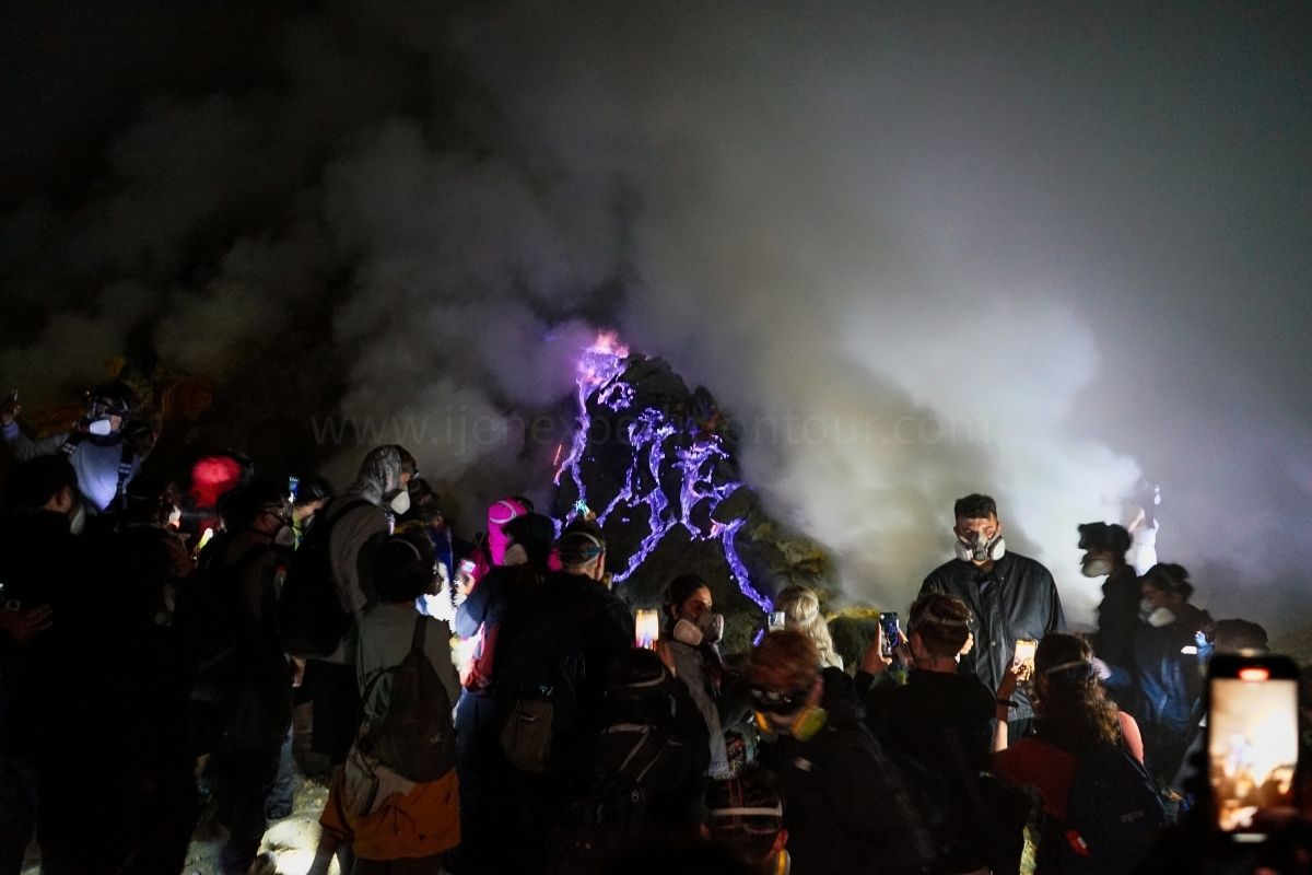 Blue fire sulfur flames at Kawah Ijen volcano Indonesia