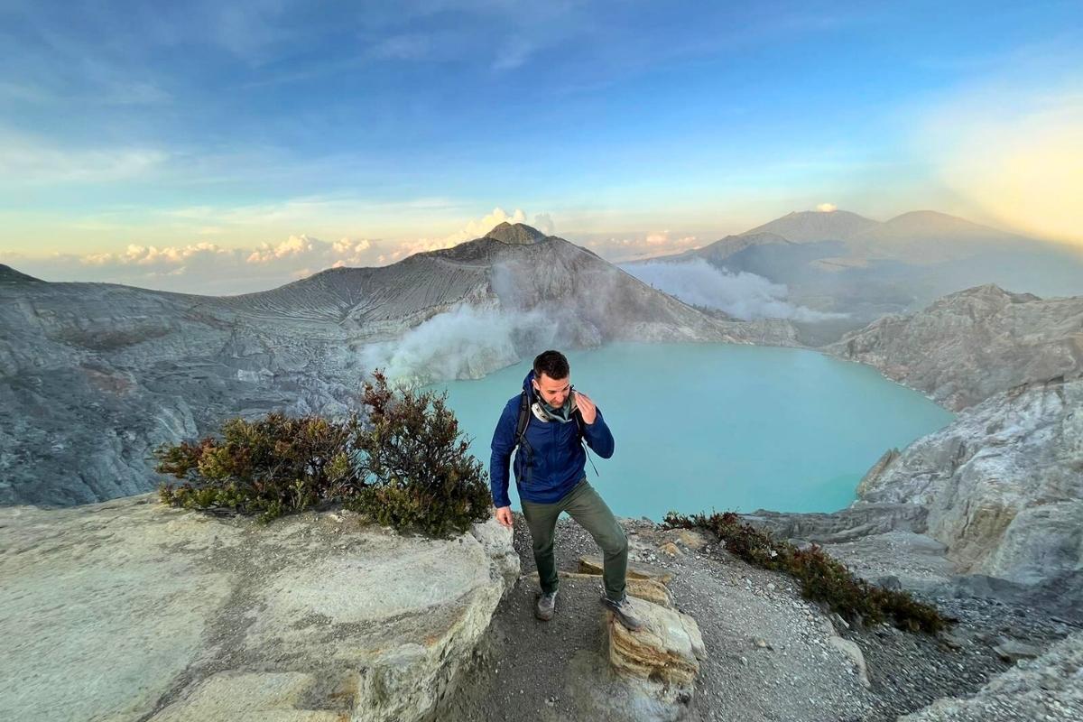 Tourists hiking the trail to Ijen Crater during night trek