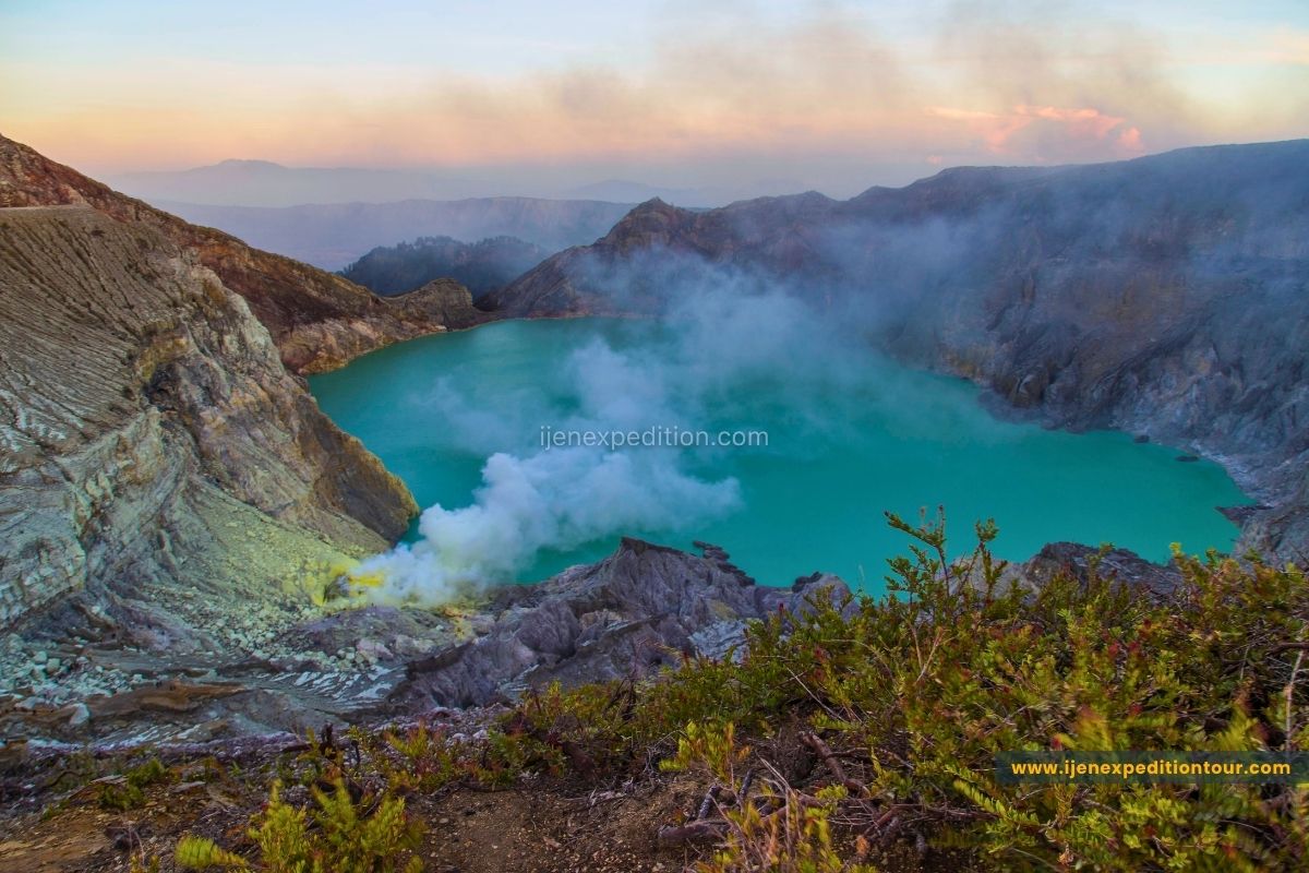 Turquoise crater lake at Kawah Ijen volcano East Java