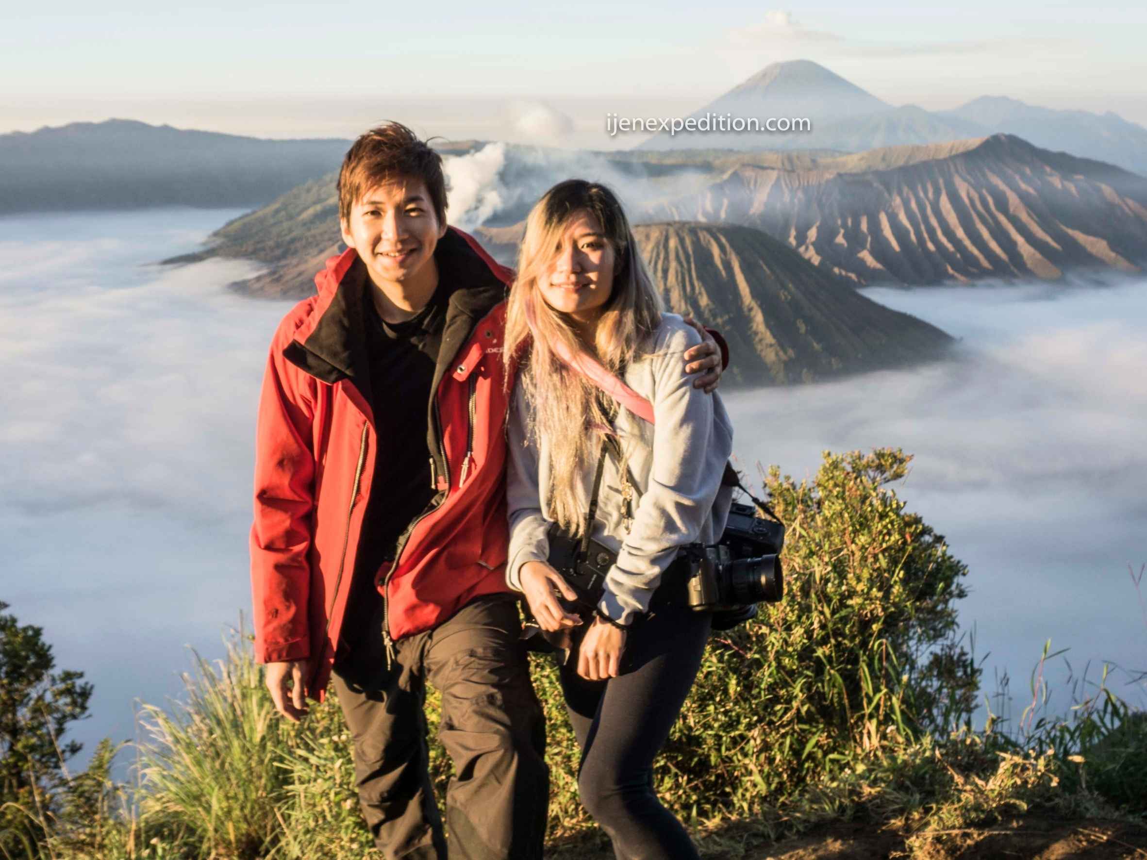 Traveler consulting local guide during East Java adventure trip